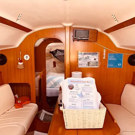 Surfbird Cozy Sailboat Escape *